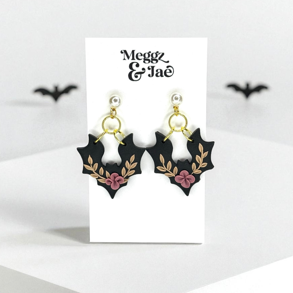 “Floral bats” polymer clay dangle earrings
