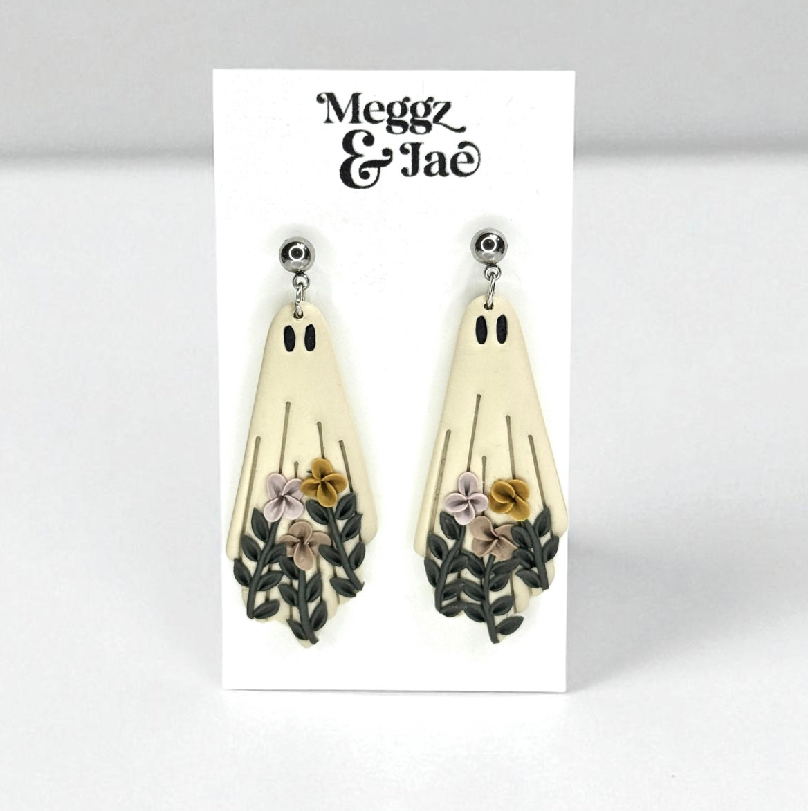 “Floral ghost” polymer clay dangle earrings