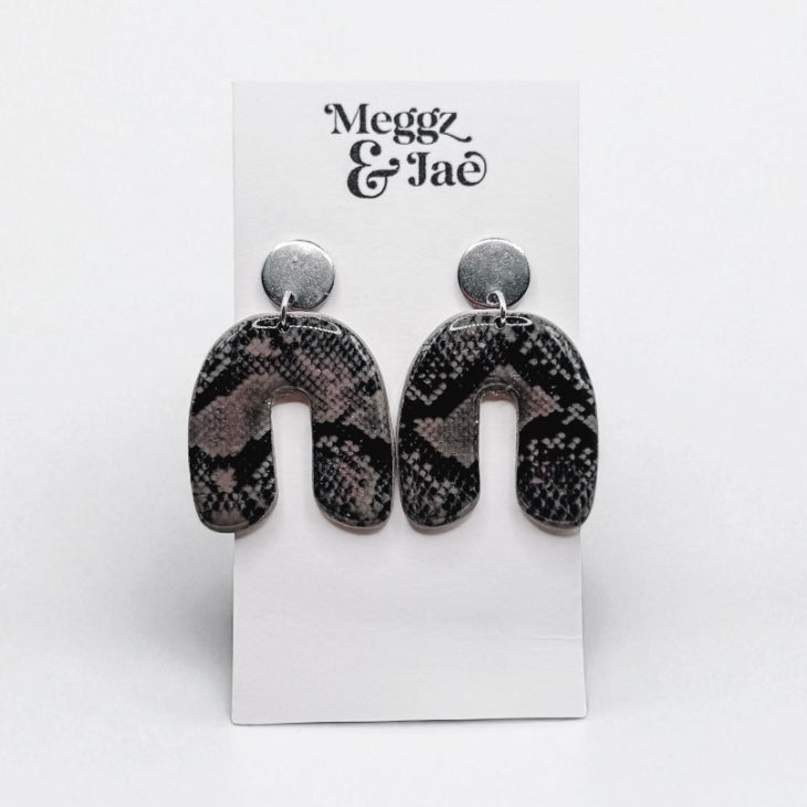 “Layla” snake skin arch dangles