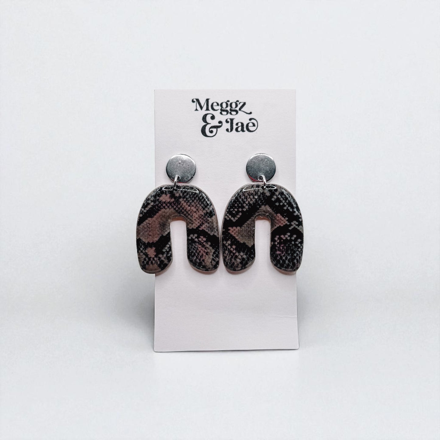 “Layla” snake skin arch dangles
