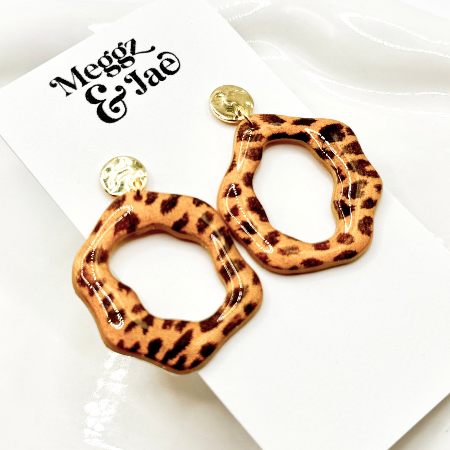 “Carol” cheetah print modern dangles