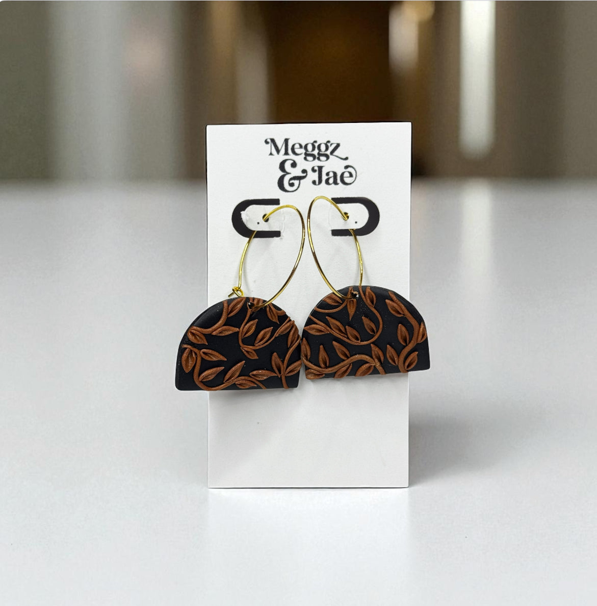“Amber” black and copper leaf hoop dangle earrings
