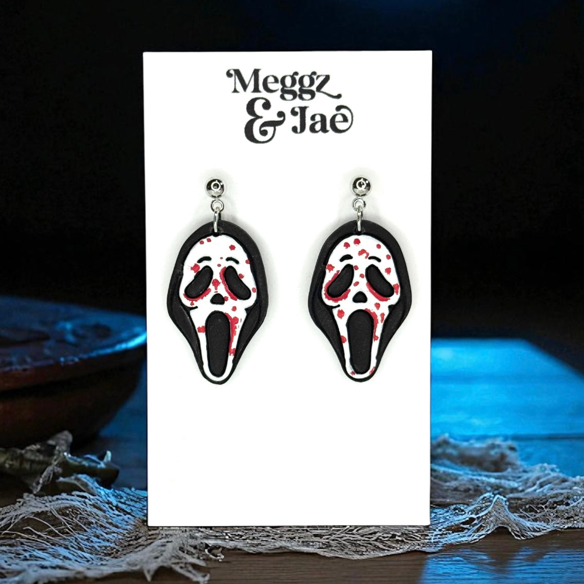 “Scary” movie ghost face polymer clay dangle earrings