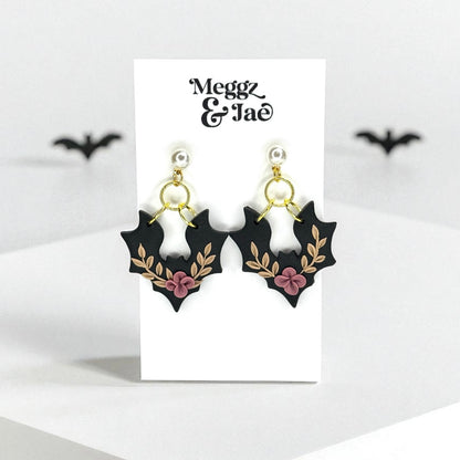 “Floral bats” polymer clay dangle earrings