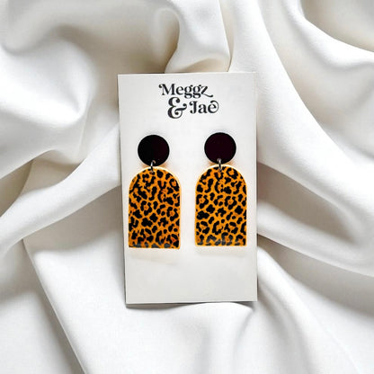 “Missy” shimmer leopard arch dangles