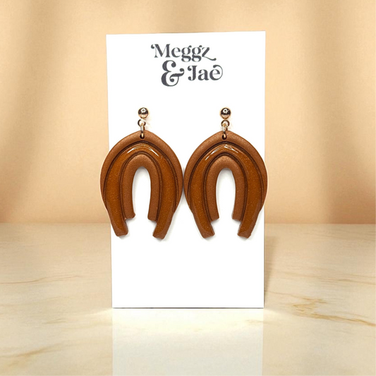 “Audrina” Rust shimmer decorative arch with resin dangles