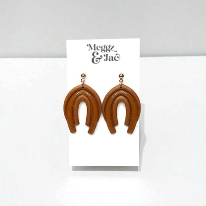 “Audrina” Rust shimmer decorative arch with resin dangles