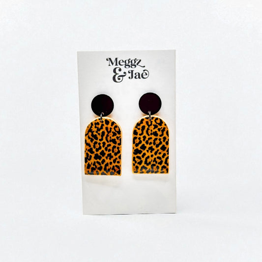 “Missy” shimmer leopard arch dangles