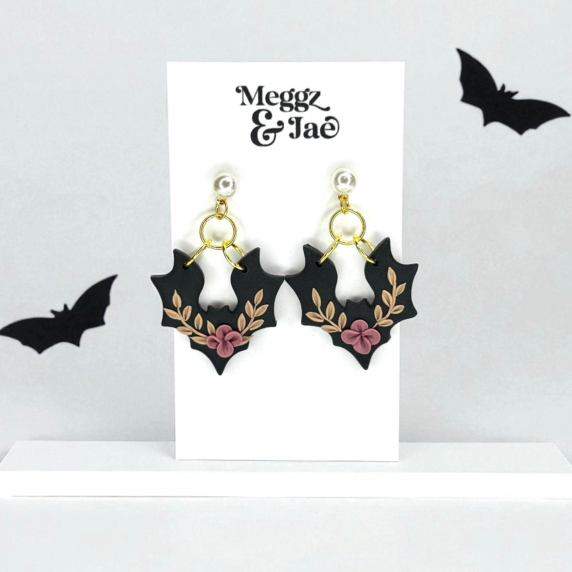 “Floral bats” polymer clay dangle earrings