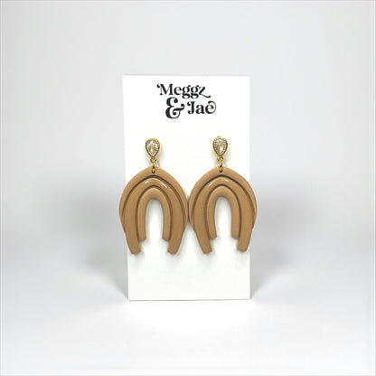 “Abby” Neutral beige arch style dangles with cz topper