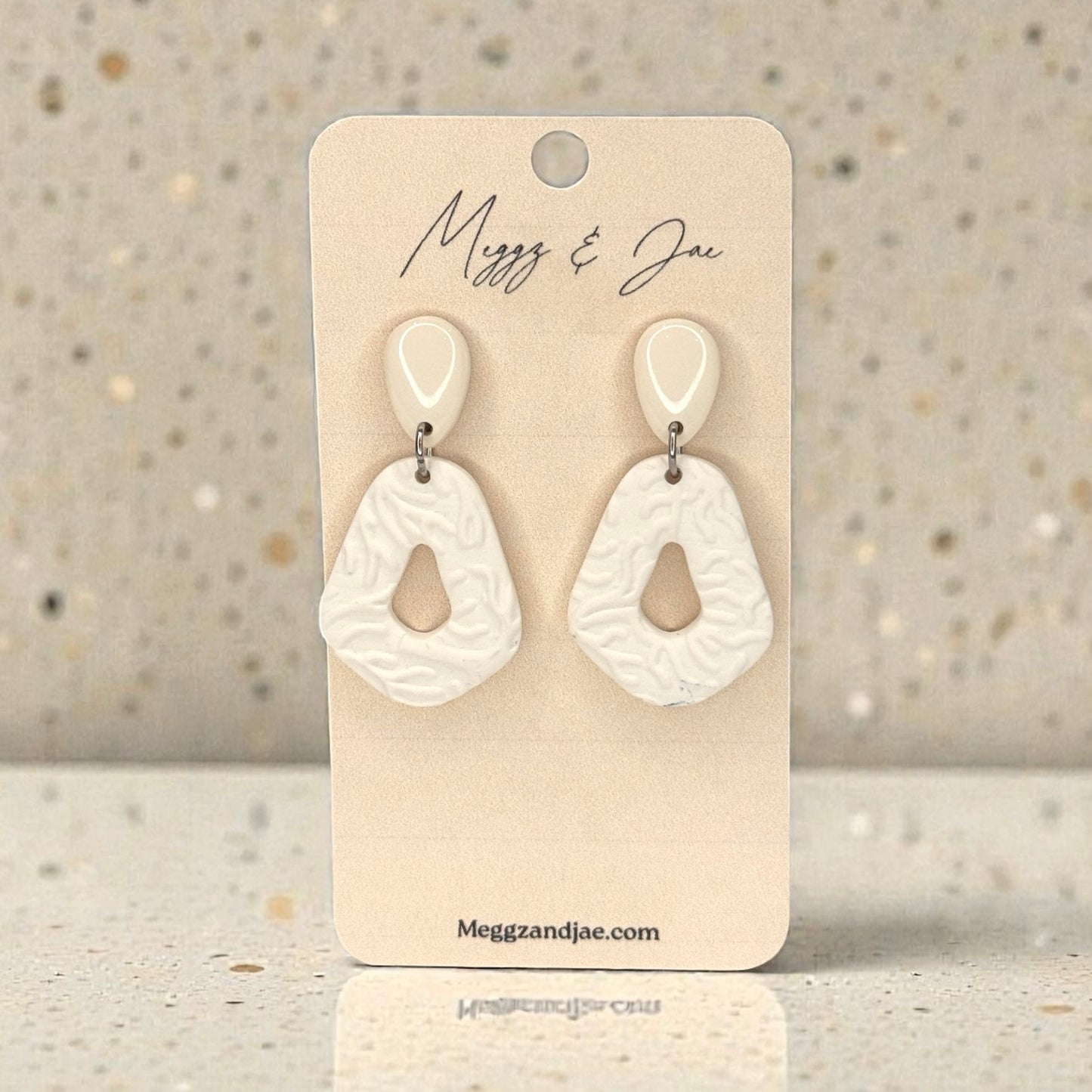 Neutral white textures teardrop with cut out polymer clay earrings