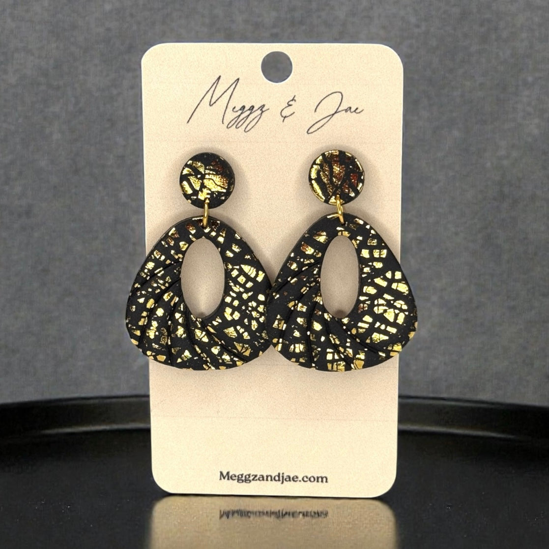 Black metallic foil triangle with cutout polymer clay earrings