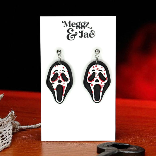 “Scary” movie ghost face polymer clay dangle earrings